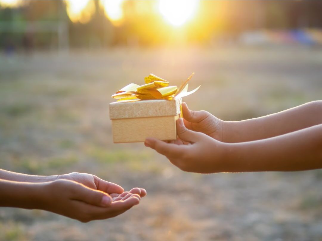 child giving gift